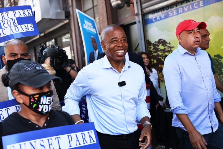 Eric Adams campaigns with Mexican American community leaders in Brooklyn's Sunset Park neighborhood. Adams is the frontrunner thanks to his leads with Black and Latino voters.