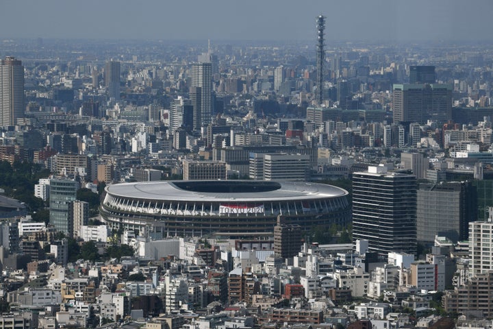 A general view shows the National Stadium (C), the main venue for the 2020 Olympic and Paralympic Games in Tokyo on June 21,