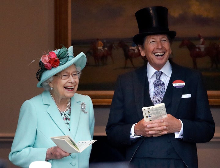 Queen Elizabeth II accompanied by her racing manager John Warren, attends day 5 of Royal Ascot at Ascot Racecourse on June 19, 2021 in Ascot, England. 