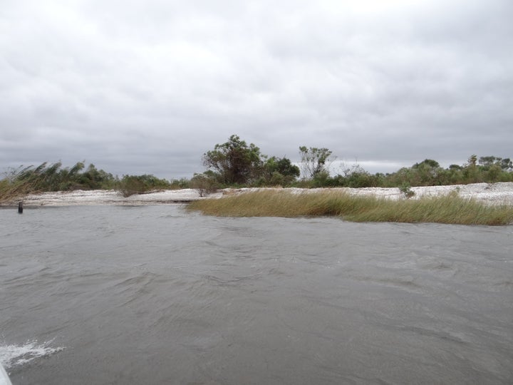 A view of St. Malo from the water. There are no structures left because the wetlands are sinking into the sea.