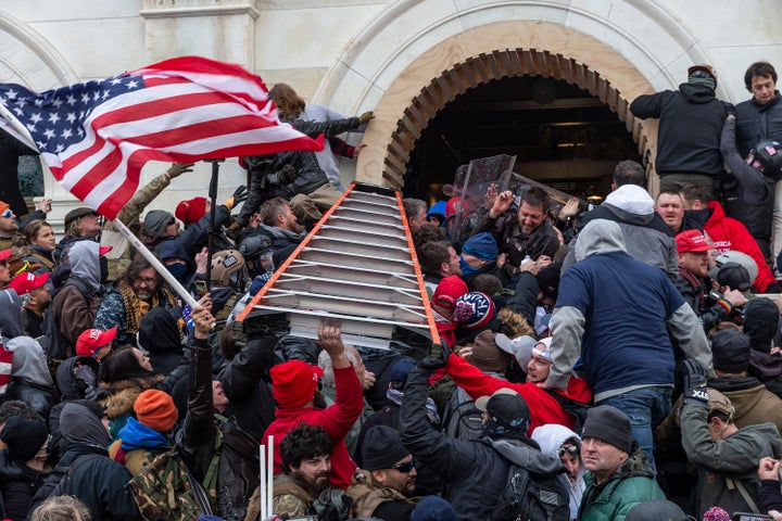 Rioters on clash with police while trying to enter the Capitol building on Jan. 6.