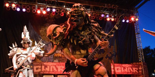 CHICAGO, IL - SEPTEMBER 13: (EDITOR'S NOTE: Image not to be used in any publication devoted exclusively or predominantly to artist pictured) Pustulus Maximus of Gwar performs on stage on Day 1 of Riot Fest and Carnival 2013 at Humboldt Park on September 13, 2013 in Chicago, Illinois. (Photo by Daniel Boczarski/Redferns via Getty Images)