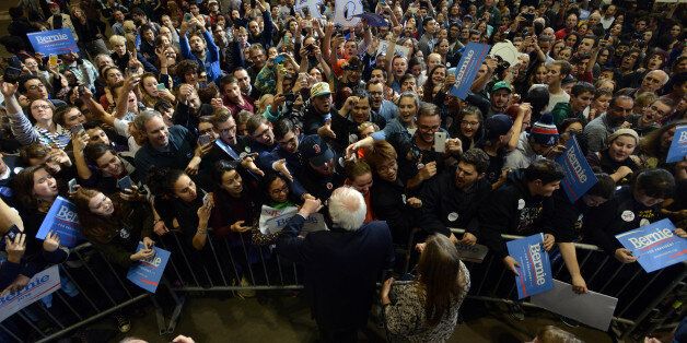 BOSTON, MA - OCTOBER 3: Democratic Presidential candidate Bernie Sanders signs autographs with supporters following a rally at the Boston Convention and Exhibition Center October 3, 2015 in Boston, Massachusetts. Thousands of people attended the rally, one of the biggest in recent state history for a politician. (Photo by Darren McCollester/Getty Images)