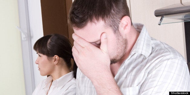 angry couple with problems in...