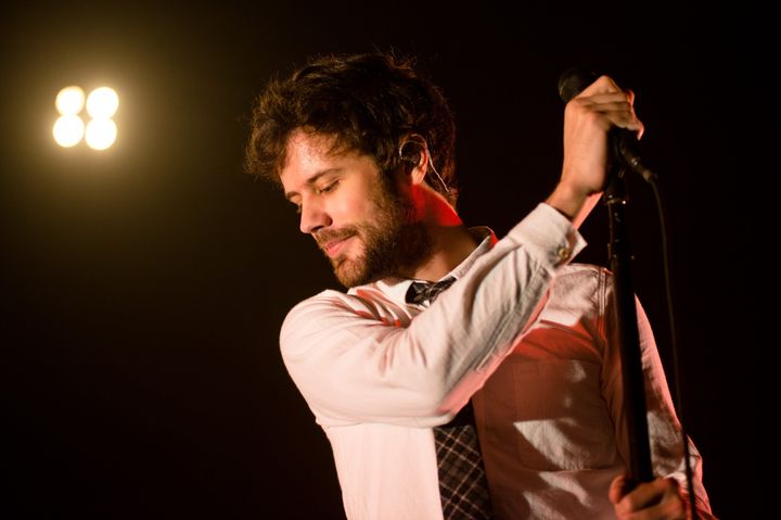 LONDON, UNITED KINGDOM - NOVEMBER 20: Michael Angelakos of Passion Pit performs on stage at The Forum on November 20, 2012 in London, United Kingdom. (Photo by Annabel Staff/Redferns via Getty Images)