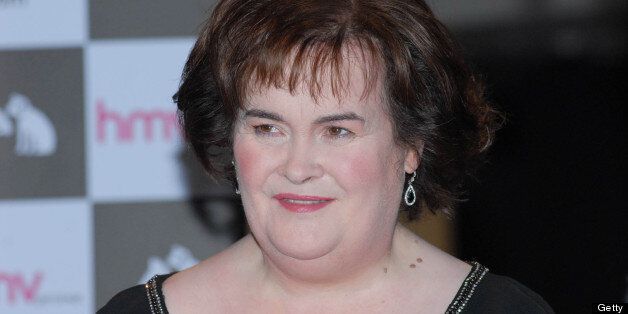 GLASGOW, UNITED KINGDOM - NOVEMBER 20: Susan Boyle meets fans and signs copies of her new album 'Standing Ovation' at HMV on November 20, 2012 in Glasgow, Scotland. (Photo by Martin Grimes/Getty Images)