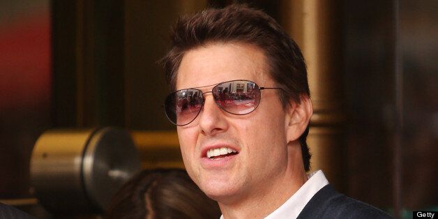 HOLLYWOOD, CA - JUNE 24: Tom Cruise attends the ceremony honoring Jerry Bruckheimer with a Star on The Hollywood Walk of Fame held in front of El Capitan Theatre on June 24, 2013 in Hollywood, California. (Photo by Michael Tran/FilmMagic)