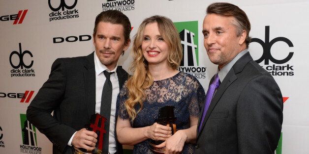 BEVERLY HILLS, CA - OCTOBER 21: Honorees Ethan Hawke, Julie Delpy and director Richard Linklater pose in the press room during the 17th annual Hollywood Film Awards at The Beverly Hilton Hotel on October 21, 2013 in Beverly Hills, California. (Photo by Jason Kempin/Getty Images)