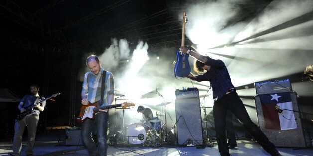 AUSTIN, TX - NOVEMBER 4: (L - R) Mark Smith, Michael James, Chris Hrasky, and Munaf Rayani of Explosions in the Sky perform as part of the Fun Fun Fun Festival at Auditorium Shores on November 4, 2012 in Austin, Texas. (Photo by Tim Mosenfelder/Getty Images)