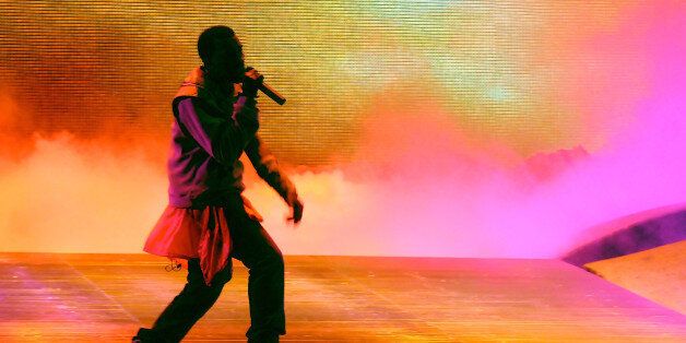 MANCHESTER, TN - JUNE 14: Kanye West performs on stage during Bonnaroo 2008 on June 14, 2008 in Manchester, Tennessee. (Photo by Jeff Kravitz/FilmMagic) 