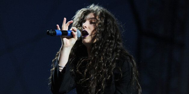 INDIO, CA - APRIL 19: Singer Lorde performs onstage during day 2 of the 2014 Coachella Valley Music & Arts Festival at the Empire Polo Club on April 19, 2014 in Indio, California. (Photo by Kevin Winter/Getty Images for Coachella)