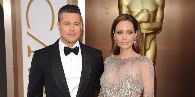HOLLYWOOD, CA - MARCH 02: Actors Brad Pitt and Angelina Jolie arrive at the 86th Annual Academy Awards at Hollywood & Highland Center on March 2, 2014 in Hollywood, California. (Photo by Axelle/Bauer-Griffin/FilmMagic)