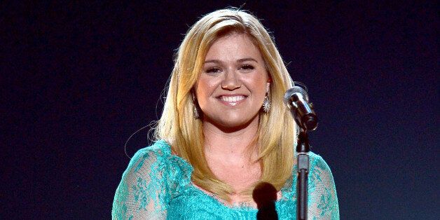 LAS VEGAS, NV - APRIL 07: Singer Kelly Clarkson performs onstage during the 48th Annual Academy of Country Music Awards at the MGM Grand Garden Arena on April 7, 2013 in Las Vegas, Nevada. (Photo by Ethan Miller/Getty Images)