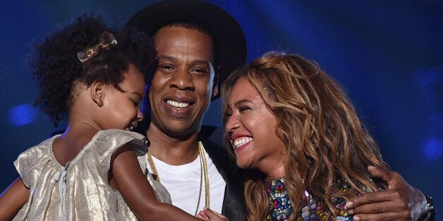 INGLEWOOD, CA - AUGUST 24: (L-R) Blue Ivy Carter, recording artists Jay Z and Beyonce speak onstage during the 2014 MTV Video Music Awards at The Forum on August 24, 2014 in Inglewood, California. (Photo by MTV/MTV1415/Getty Images for MTV)