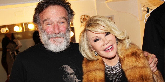 Robin Williams and Joan Rivers pose backstage at the new play 'Bengal Tiger at the Baghdad Zoo' at The Richard Rogers Theater on March 29, 2011 in New York City. (Photo by Bruce Glikas/FilmMagic)