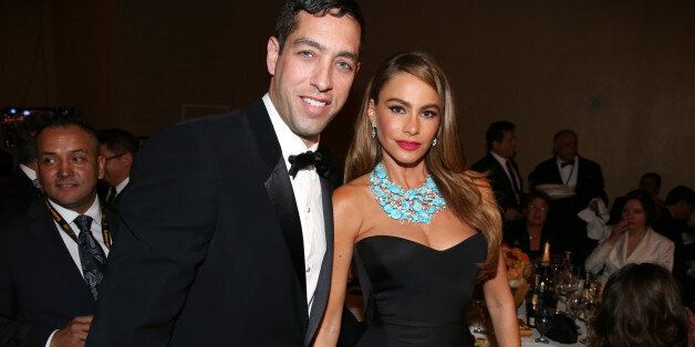 Sofia Vergara, right, and Nick Loeb pose in the audience at the 71st annual Golden Globe Awards at the Beverly Hilton Hotel on Sunday, Jan. 12, 2014, in Beverly Hills, Calif. (Photo by Matt Sayles/Invision/AP)