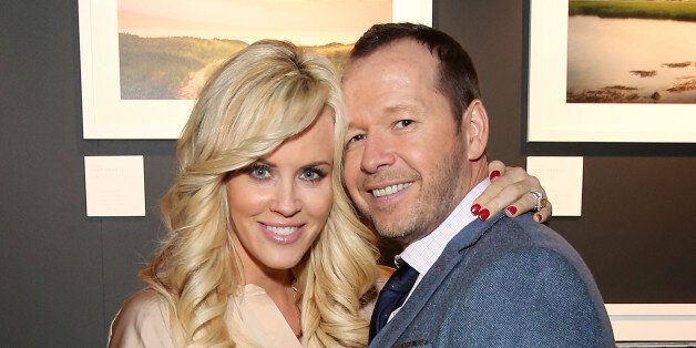 BOSTON, MA - SEPTEMBER 17: Donnie Wahlberg and Jenny McCarthy attend the Canon PIXMA PRO City Senses Gallery in Boston on September 17, 2014. (Photo by Neilson Barnard/Getty Images for Canon)