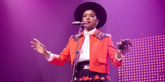 PARIS, FRANCE - SEPTEMBER 13: Lauryn Hill performs at Le Zenith on September 13, 2014 in Paris, France. (Photo by David Wolff - Patrick/Redferns via Getty Images)