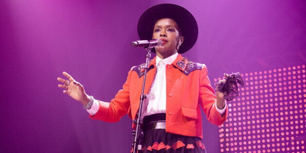 PARIS, FRANCE - SEPTEMBER 13: Lauryn Hill performs at Le Zenith on September 13, 2014 in Paris, France. (Photo by David Wolff - Patrick/Redferns via Getty Images)