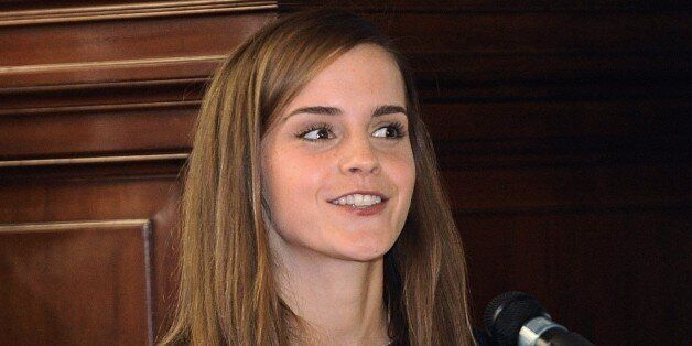 British Actor and UN Women Goodwill Ambassador Emma Watson (L) speaks, next to an unidentified translator, during the presentation of the UN Womens HeForShe campaign to Non Governmental Organizations at the Uruguay's Parliament in Montevideo on September 17, 2014. The UN project intends to mobilize one billion men and boys as advocates and agents of change in ending the persisting inequalities faced by women and girls globally. The premise is that inequality is a human rights issue, the resolution of which will benefit everyone socially, politically and economically. AFP PHOTO/ Miguel ROJO (Photo credit should read MIGUEL ROJO/AFP/Getty Images)
