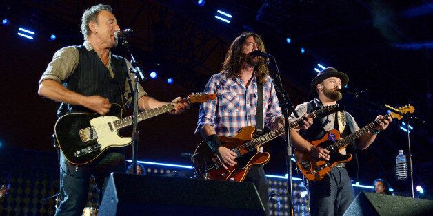 WASHINGTON, DC - NOVEMBER 11: (L-R) Musicians Bruce Springsteen, Dave Grohl and Zac Brown perform onstage during 'The Concert For Valor' at The National Mall on November 11, 2014 in Washington, DC. (Photo by Kevin Mazur/Getty Images for HBO)
