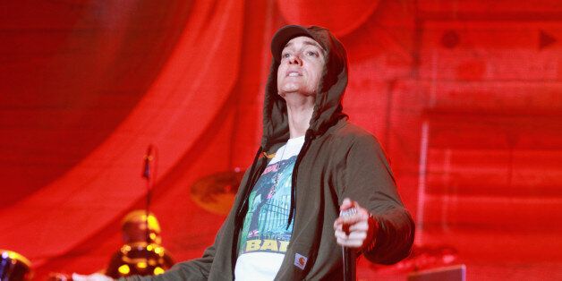 CHICAGO, IL - AUGUST 01: Eminem performs at Samsung Galaxy stage during 2014 Lollapalooza Day One at Grant Park on August 1, 2014 in Chicago, Illinois. (Photo by Barry Brecheisen/WireImage)