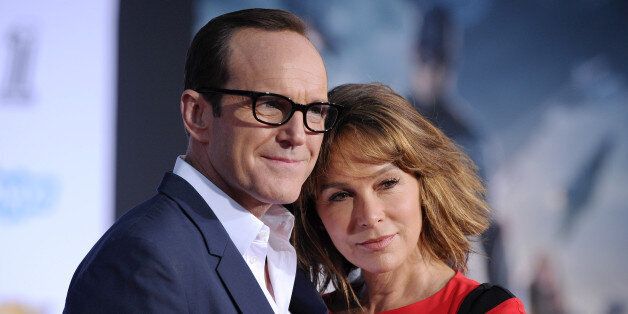 HOLLYWOOD, CA - MARCH 13: Actors Clark Gregg and Jennifer Grey arrive at the Los Angeles premiere of 'Captain America: The Winter Soldier' at the El Capitan Theatre on March 13, 2014 in Hollywood, California. (Photo by Axelle/Bauer-Griffin/FilmMagic)