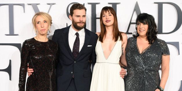 LONDON, ENGLAND - FEBRUARY 12: (L-R) Director Sam Taylor-Johnson, actors Jamie Dornan, Dakota Johnson and author E.L. James attend the UK Premiere of 'Fifty Shades Of Grey' at Odeon Leicester Square on February 12, 2015 in London, England. (Photo by Ian Gavan/Getty Images)