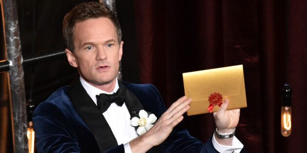 Host Neil Patrick Harris presents his Oscar predictions at the Oscars on Sunday, Feb. 22, 2015, at the Dolby Theatre in Los Angeles. (Photo by John Shearer/Invision/AP)