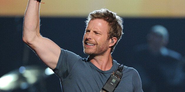 Dierks Bentley performs at ACM Presents an All-Star Salute to the Troops on Monday, April 7, 2014, in Las Vegas. (Photo by Chris Pizzello/Invision/AP)