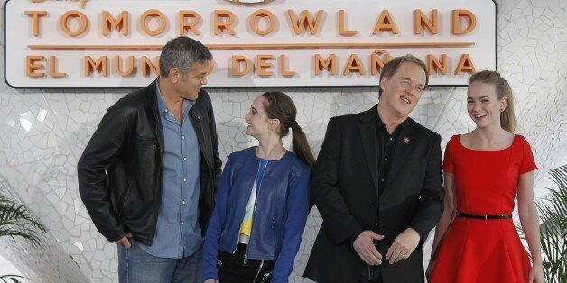 (L to R) US actor George Clooney, British Actress Raffey Cassidy, US film director Brad Brid and US Actress Britt Robenson pose during a press conference presenting their latest film 'Tomorrowland ' at the City of the Arts and Sciences in Valencia May 19,2015. AFP PHOTO / JOSE JORDAN (Photo credit should read JOSE JORDAN/AFP/Getty Images)