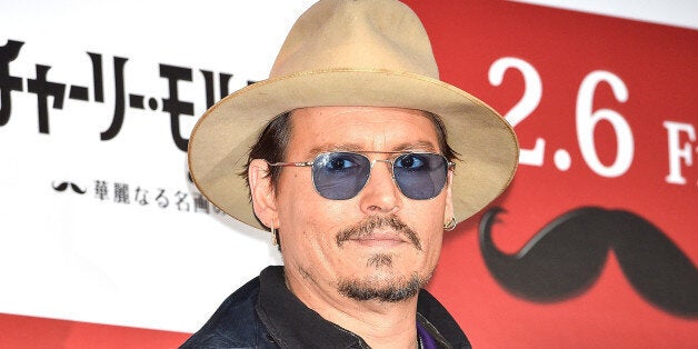 TOKYO, JAPAN - JANUARY 28: Johnny Depp attends the photo call for 'Mortdecai' at The Peninsula Tokyo on January 28, 2015 in Tokyo, Japan. (Photo by Koki Nagahama/Getty Images)