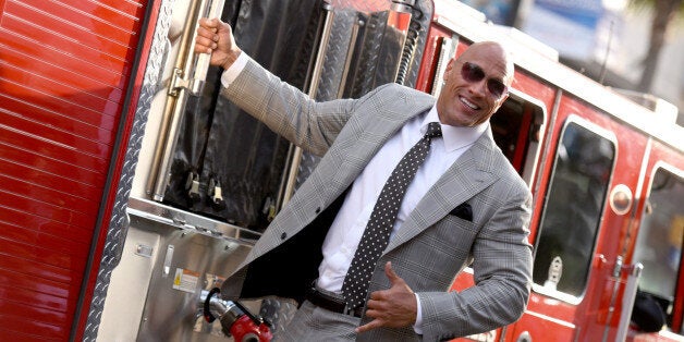 Dwayne Johnson arrives at the world premiere of "San Andreas" at the TCL Chinese Theatre on Tuesday, May 26, 2015, in Los Angeles. (Photo by Richard Shotwell/Invision/AP)