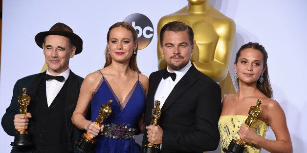 Mark Rylance, winner of the award for best actor in a supporting role for âBridge of Spies," from left, Brie Larson, winner of the award for best actress in a leading role for âRoomâ, Leonardo DiCaprio, winner of the award for best actor in a leading role for âThe Revenantâ, and Alicia Vikander, winner of the award for best actress in a supporting role for âThe Danish Girlâ pose in the press room at the Oscars on Sunday, Feb. 28, 2016, at the Dolby Theatre in Los Angeles. (Photo by Jordan Strauss/Invision/AP)