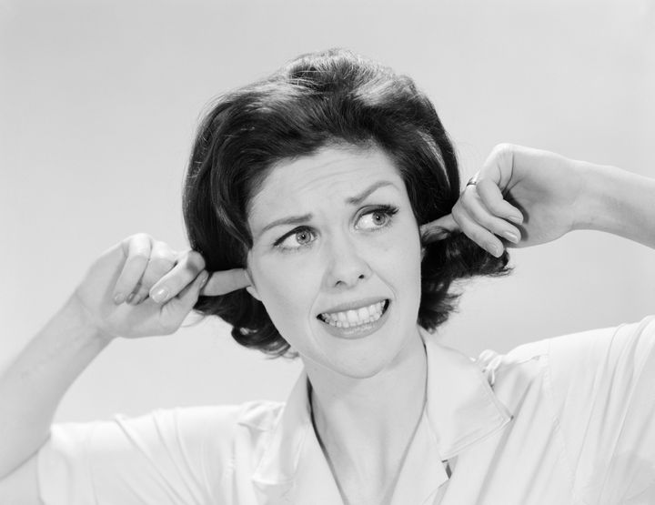 UNITED STATES - CIRCA 1960s: Woman sticking fingers in her ears. (Photo by H. Armstrong Roberts/Retrofile/Getty Images)