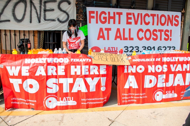 Members of the Los Angeles Tenants Union protest against evictions and give out food for homeless people in Hollywood, Califo