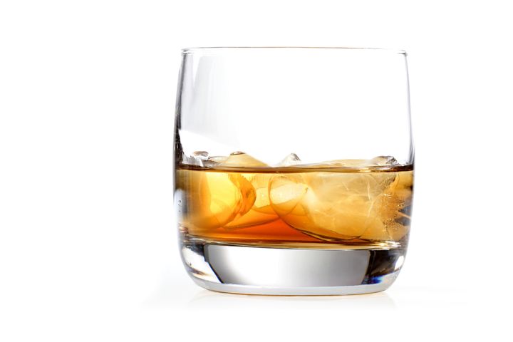 close up of glass with whisky