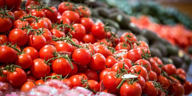 Tomatoes are displayed for sale in the produce section of a Coles supermarket, operated by Wesfarmers Ltd., in Sydney, Australia, on Tuesday, Feb. 18, 2014. Wesfarmers, Australia's largest employer, is scheduled to report first-half earnings on Feb. 19. Photographer: Ian Waldie/Bloomberg via Getty Images