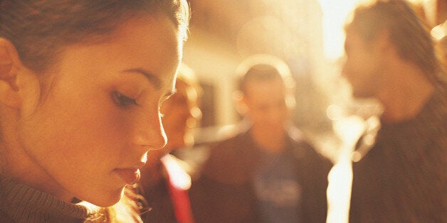 Portrait of a Woman in the Street with Three People in the Background