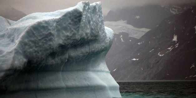 In this July 26, 2011 photo, a melting iceberg floats along a fjord leading away from the edge of the Greenland ice sheet near Nuuk, Greenland. (AP Photo/Brennan Linsley)
