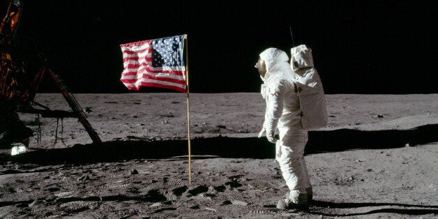 Buzz Aldrin salutes the U.S. Flag. His fingertips are visible on the far side of his faceplate. Note the well-defined footprints in the foreground. Buzz is facing up-Sun. There is a reflection of the Sun in his visor. At the bottom of Buzz's faceplate, note the white 'rim' which is slightly separated from his neckring. This 'rim' is the bottom of his gold visor, which he has pulled down. We can see the LEC straps hanging down inside of the ladder strut. In the foreground, we can see the foot-grabbing loops in the TV cable. The double crater under Neil Armstrong's Lunar Module window is just beyond the Lunar Module shadow.To learn more about Apollo 11 go to: www.nasa.gov/apollo45/ or www.nasa.gov/externalflash/apollo11_40/Credit: NASA/APOLLO 11NASA Goddard Space Flight Center is home to the nation's largest organization of combined scientists, engineers and technologists that build spacecraft, instruments and new technology to study the Earth, the sun, our solar system, and the universe.Follow us on TwitterJoin us on Facebook