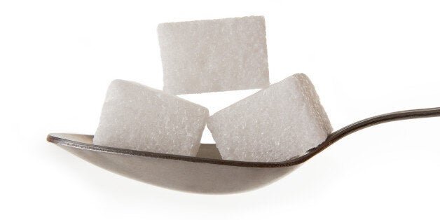 lump sugar on a spoon