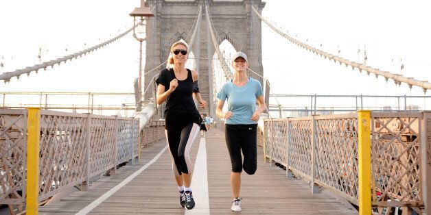 (EXCLUSIVE, Premium Rates Apply) (EXCLUSIVE COVERAGE) Brooklyn Decker joins Heidi Klum on her AOL summer run across the Brooklyn Bridge on July 12, 2011 in New York City.