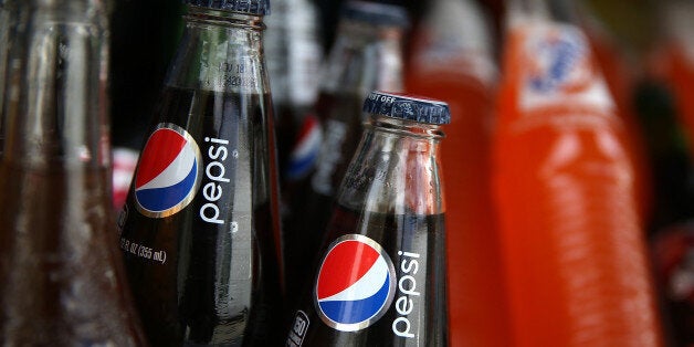 SAN FRANCISCO, CA - JULY 22: Bottles of Pepsi are displayed in a food truck's cooler on July 22, 2014 in San Francisco, California. The San Francisco Board of Supervisors will vote on Tuesday to place a measure on the November ballot for a 2-cents-per-ounce soda tax. If the measure passes in the November election, tax proceeds would help finance nutrition, health, disease prevention and recreation programs. (Photo by Justin Sullivan/Getty Images)