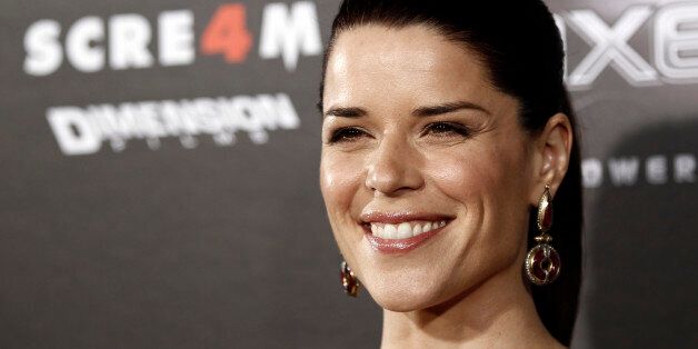 Cast member Neve Campbell arrives at the premiere of "Scream 4" in Los Angeles on Monday, April 11, 2011. "Scream 4" opens in theaters April 15. (AP Photo/Matt Sayles)