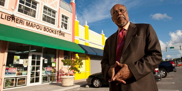 Jean Mapou is the owner of Libreri Mapou Bookstore in the Little Haiti section of Miami, Florida, and he is planning on sticking it out through tough times as the recession has hit businesses in the area very hard. (C.W. Griffin/Miami Herald/MCT via Getty Images)