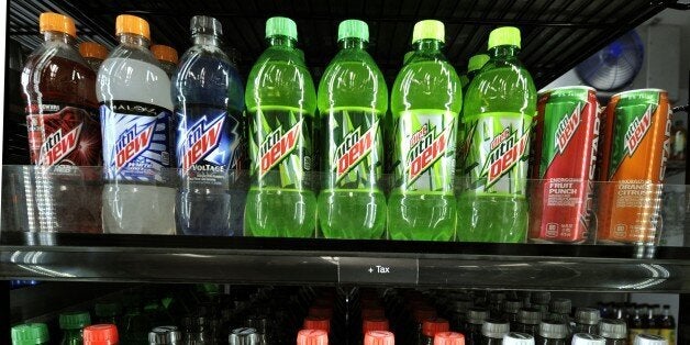 A refrigarator full of 20oz drinks at a 7-11 on the Upper East Side of New York City March 11, 2013. Today was suppose to be the last day New Yorkers were able to purchase super-sized sugary drinks at restaurants, movie theaters, sports venues and street carts in New York City, but New York Supreme Court Judge Milton Tingling ruled Monday that the city may not enforce the new regulation. 7-11 was always excempt from the regulation. AFP PHOTO / TIMOTHY A. CLARY (Photo credit should read TIMOTHY A. CLARY/AFP/Getty Images)