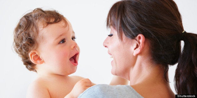 Close up shot of a tender moment between mother and baby