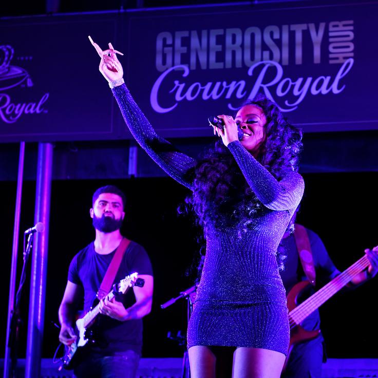 R&B singer-songwriter Ari Lennox performs at the Crown Royal #GenerosityHour to give back to Washington Heights hospitality workers at The Hudson on June 15 in New York City.