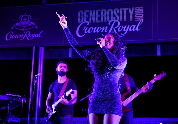 R&B singer-songwriter Ari Lennox performs at the Crown Royal #GenerosityHour to give back to Washington Heights hospitali